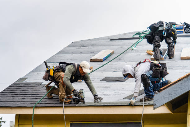 Professional Roofing technician working in Sterling Forest, NY